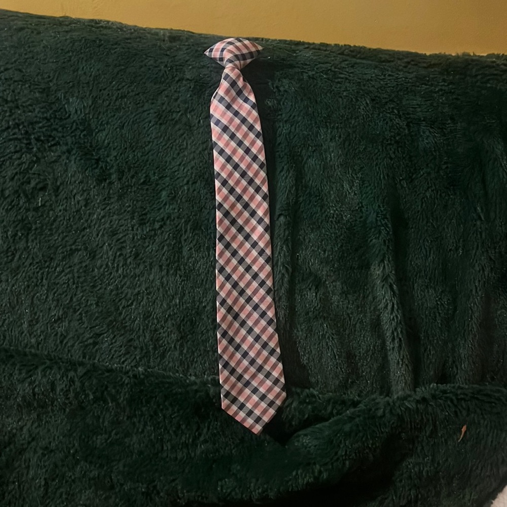 A boys clip on tie navy/ gold great condition